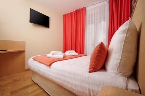 Habitación Doble Estándar del hotel VLH Montparnasse Eiffel. Foto 11
