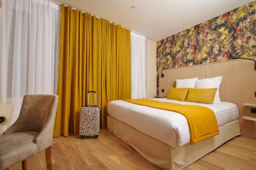 Habitación Deluxe del hotel VLH Montparnasse Eiffel. Foto 4