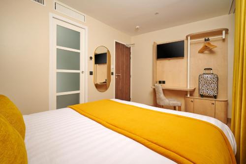 Habitación Deluxe del hotel VLH Montparnasse Eiffel. Foto 5