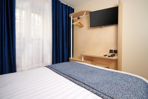 Habitación Deluxe del hotel VLH Montparnasse Eiffel. Foto 10