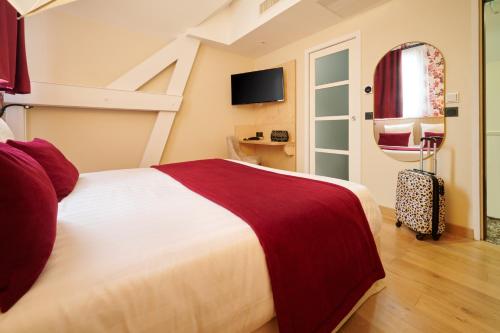 Habitación Deluxe del hotel VLH Montparnasse Eiffel. Foto 12