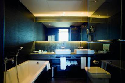 Suite 1 cama del hotel Novotel Barcelona City. Foto 1