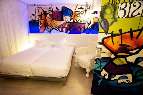 Habitación doble Normal del hotel Dormirdcine Cooltural Rooms. Foto 2