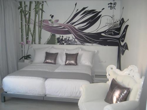 Habitación doble Normal del hotel Dormirdcine Cooltural Rooms. Foto 6