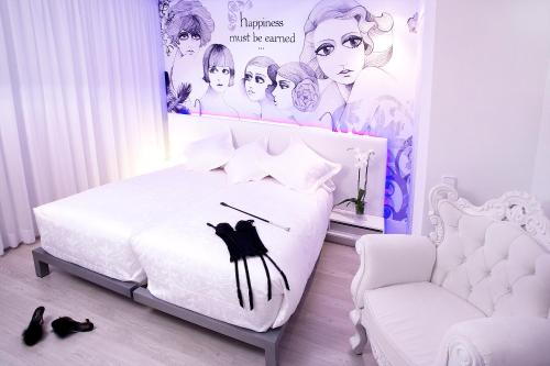 Habitación doble Normal del hotel Dormirdcine Cooltural Rooms. Foto 11