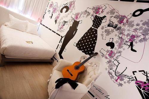 Habitación doble Normal del hotel Dormirdcine Cooltural Rooms. Foto 14