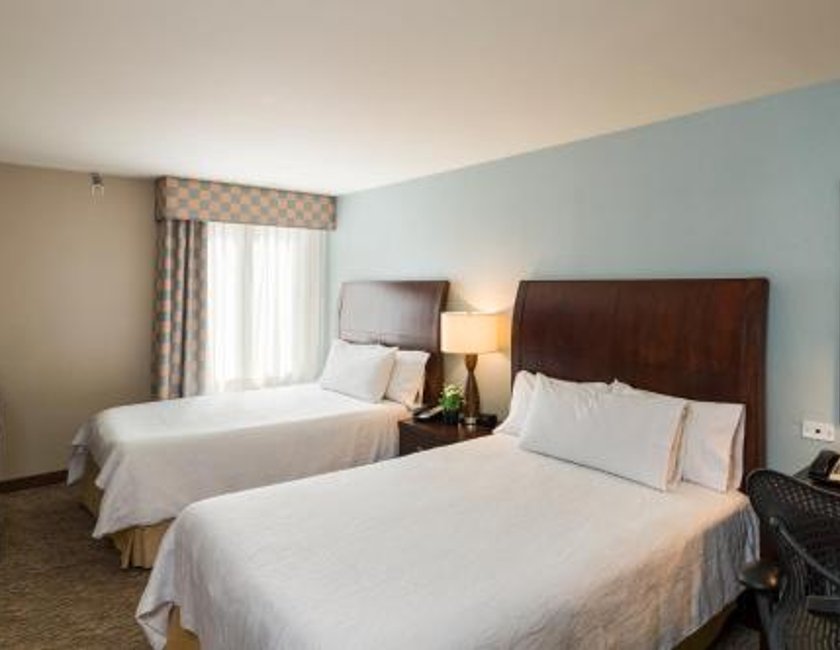 Habitación con ducha a ras de suelo, adaptada para personas de movilidad reducida - Cama extragrande del hotel AMTD Idea Tribeca. Foto 3