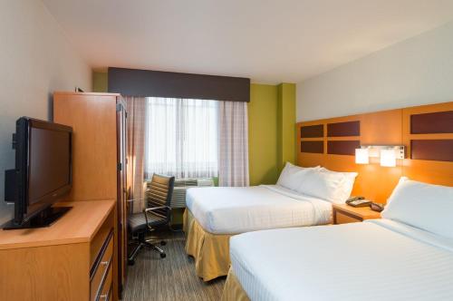 Habitación Estándar - Planta superior del hotel Holiday Inn Express New York City Times Square. Foto 3