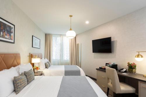 Hab. Deluxe 2 camas dobles del hotel Broadway Plaza. Foto 14