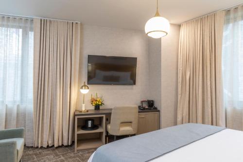 Habitación Deluxe con cama extragrande del hotel Broadway Plaza. Foto 3