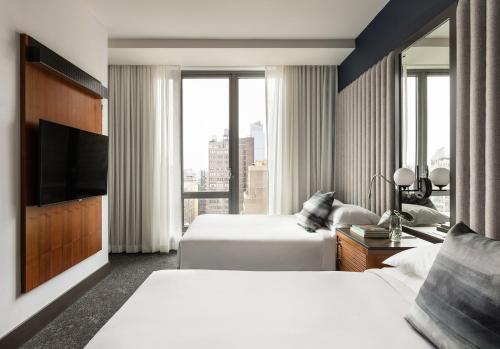 Habitación Estándar Queen con 2 camas queen - Adaptada para personas con discapacidad auditiva del hotel Kimpton Hotel Eventi