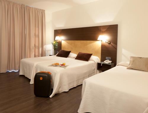 Habitación Triple del hotel Madrid Torrejón Plaza. Foto 2