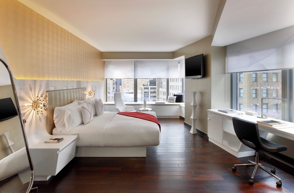 Suite Deluxe, 1 cama de matrimonio grande, vistas a la ciudad del hotel The Washington. Foto 1