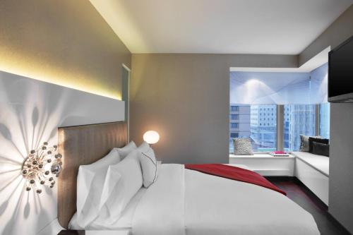 Suite de 1 dormitorio con vistas a la ciudad - 1 cama extragrande - No fumadores del hotel The Washington. Foto 1