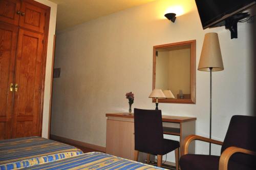 Habitación Doble - 1 o 2 camas del hotel España. Foto 7