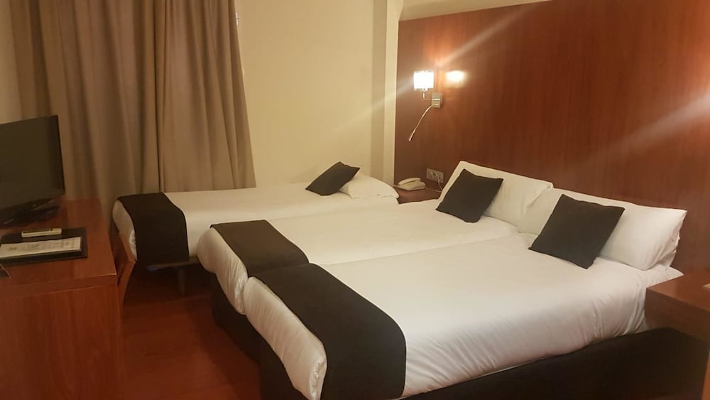 Habitación estándar con 2 camas individuales (Extra bed/Cama Supletoria) del hotel Sercotel Familia Conde