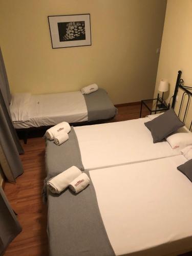 Habitación Triple del hotel Orfebre Góngora