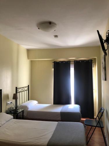 Habitación Doble Estándar - 1 o 2 camas del hotel Orfebre Góngora. Foto 28