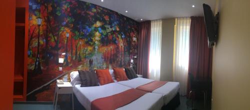 Habitación Triple del hotel Indiana. Foto 13