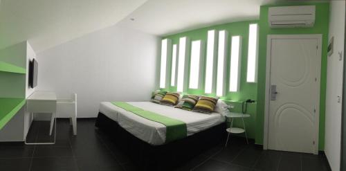 Habitación Triple Deluxe del hotel Indiana. Foto 5