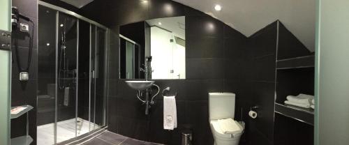 Habitación Triple Deluxe del hotel Indiana. Foto 6