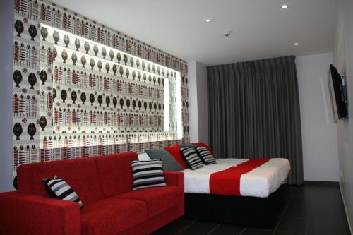 Habitación Triple Deluxe del hotel Indiana. Foto 12