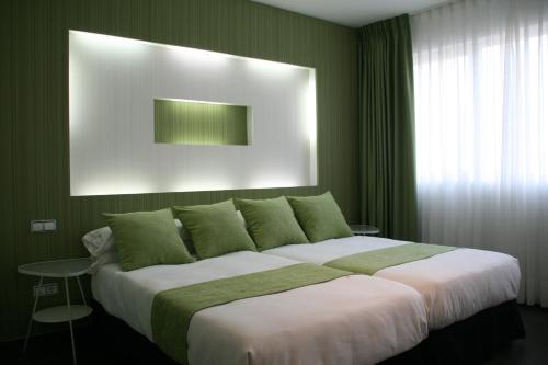 Habitación Triple Deluxe del hotel Indiana. Foto 14