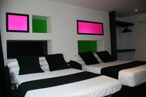 Habitación Triple Deluxe del hotel Indiana. Foto 17