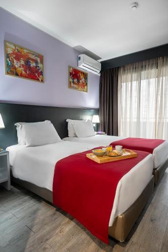 Habitación Doble - 2 camas del hotel Urban Estação. Foto 1