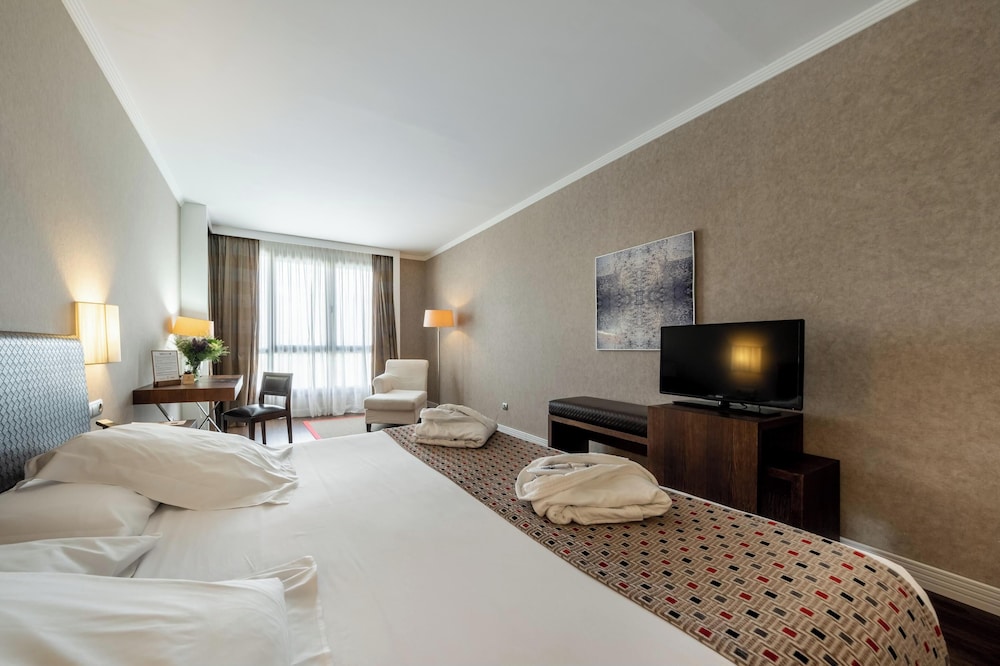 Habitación estándar con 1 cama doble o 2 individuales del hotel Castilla Termal Balneario De Olmedo. Foto 2