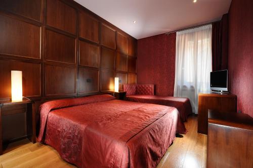 Habitación Triple Estándar del hotel Abbazia. Foto 2