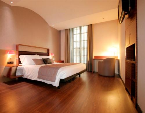 Habitación con cama extragrande - No fumadores del hotel Sure by Best Western Turin City Centre. Foto 1