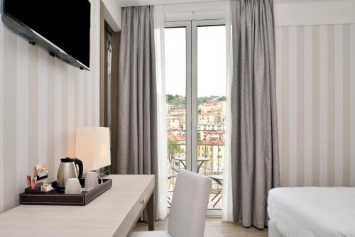 Habitación Doble Deluxe con balcón - 1 o 2 camas del hotel FIRENZE E CONTINENTALE