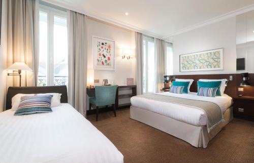 Habitación Doble Deluxe con cama supletoria del hotel Montfleuri Paris
