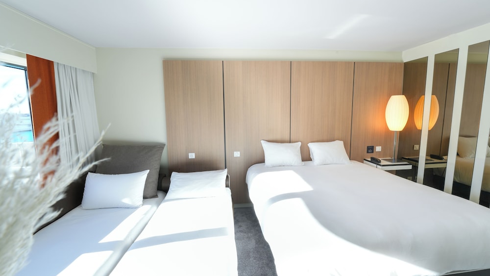 Habitación Superior Familiar del hotel Pullman Bordeaux Lac. Foto 1