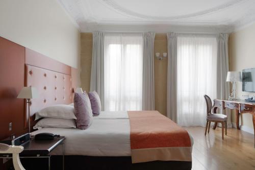 Habitación Doble adaptada para personas con discapacidad - 2 camas del hotel LE 123 ELYSEES. Foto 1