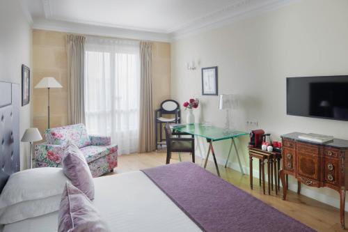 Habitación Privilege del hotel LE 123 ELYSEES. Foto 1