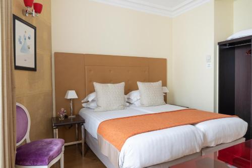 Habitación Familiar de 2 dormitorios del hotel LE 123 ELYSEES. Foto 5