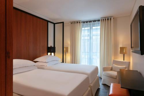 Habitación Doble Prestige - 2 camas del hotel Le Metropolitan a Tribute Portfolio. Foto 3