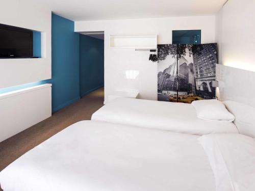 HABITACIÓN SUPERIOR CON DOS CAMAS INDIVIDUALES Y BALCÓN del hotel Ibis Styles Menton Centre