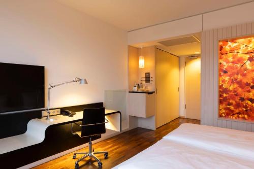 Habitación Doble Superior del hotel Scandic Berlin Potsdamer Platz. Foto 1