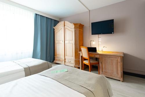 Habitación Doble Estándar - 2 camas del hotel Garner Hotel Dusseldorf - Main Station by IHG. Foto 6