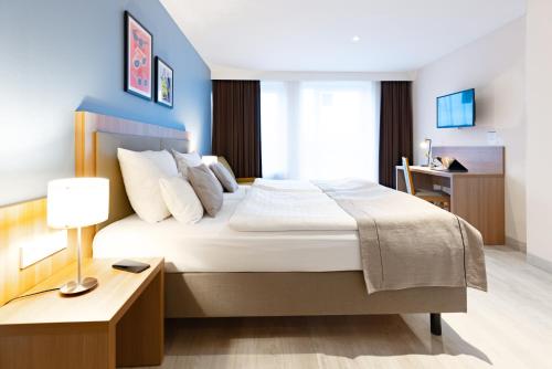 Habitación Estándar - 1 cama grande del hotel Garner Hotel Dusseldorf - Main Station by IHG. Foto 1