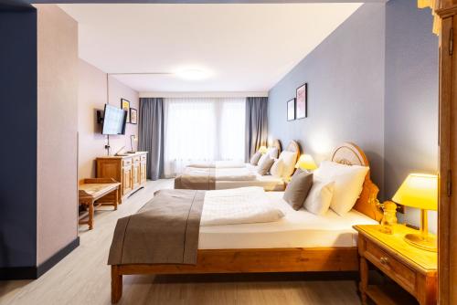 Habitación Triple del hotel Garner Hotel Dusseldorf - Main Station by IHG. Foto 7