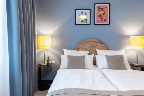 Habitación Triple Estándar del hotel Garner Hotel Dusseldorf - Main Station by IHG. Foto 3