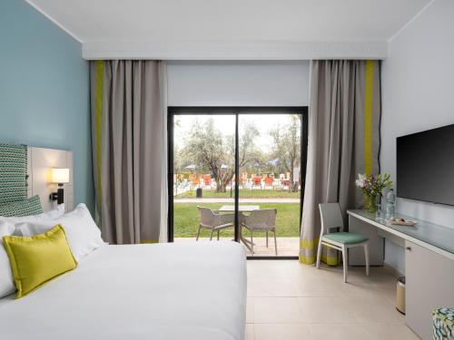 Habitación Doble Estándar - Vistas a la piscina del hotel Labranda Targa Club Aqua Parc. Foto 9