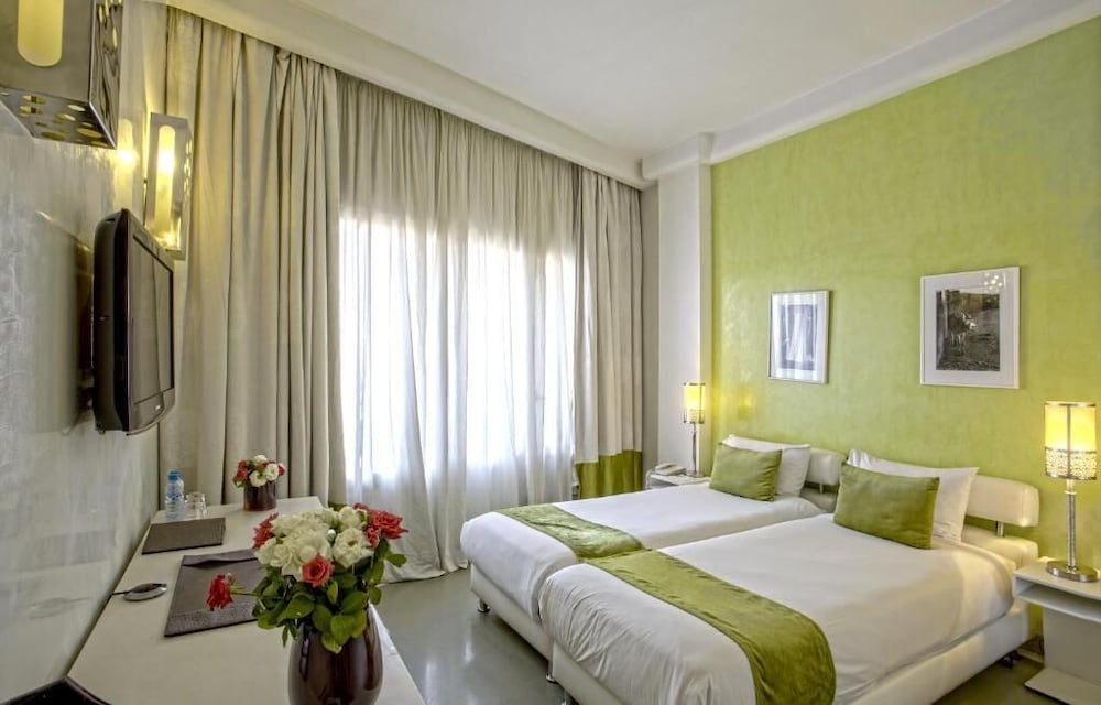 Habitación estándar doble del hotel La Renaissance Hotel. Foto 1