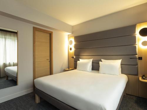 Habitación Familiar Superior - 2 camas extragrandes del hotel Novotel Brussels Centre Midi Station. Foto 3