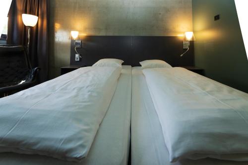 Habitación Doble Estándar - 2 camas del hotel Comfort Runway. Foto 3