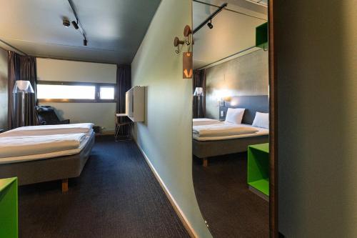 Habitación Doble Estándar del hotel Comfort Runway. Foto 1
